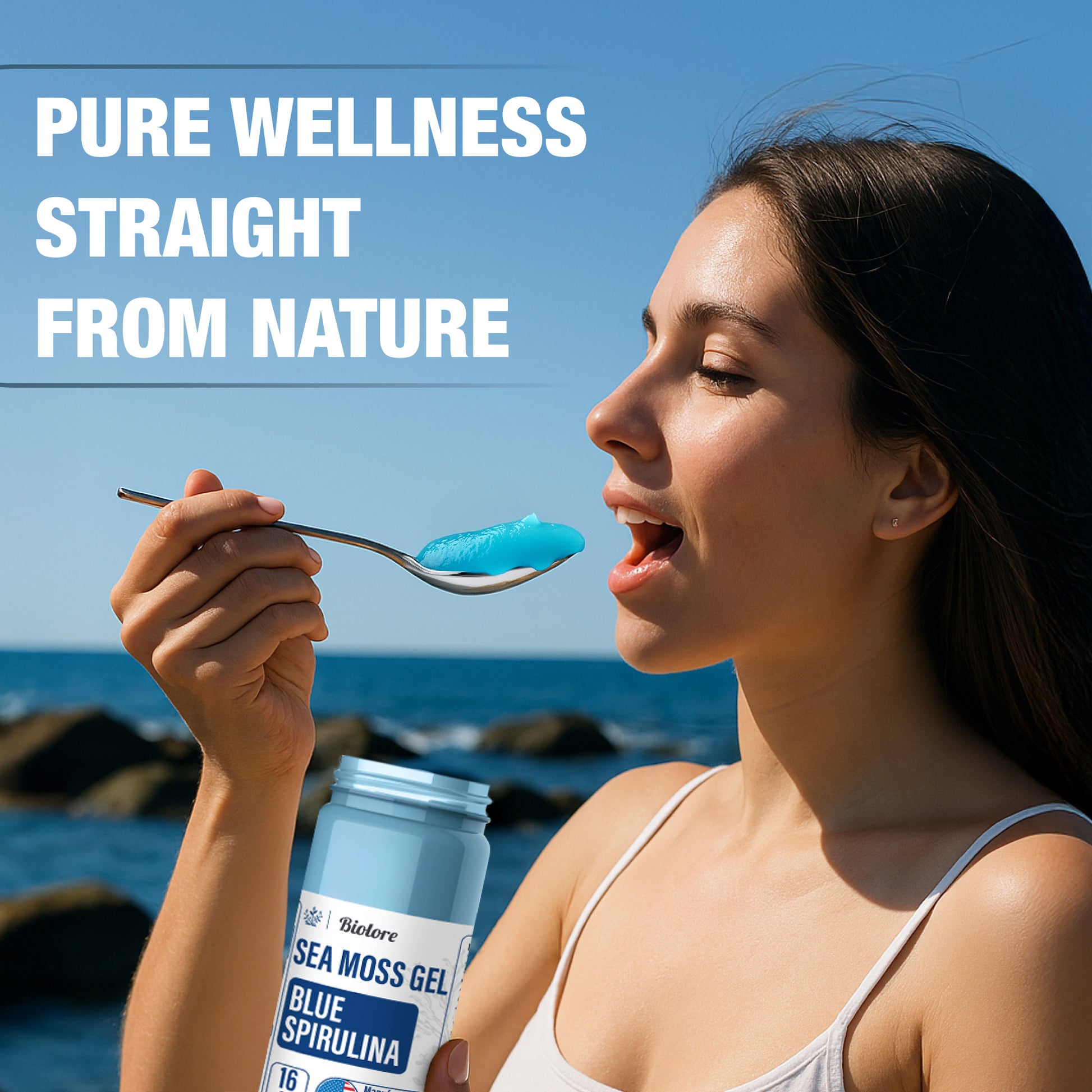 Woman eating Biolore blue spirulina sea moss gel by the ocean representing pure wellness.