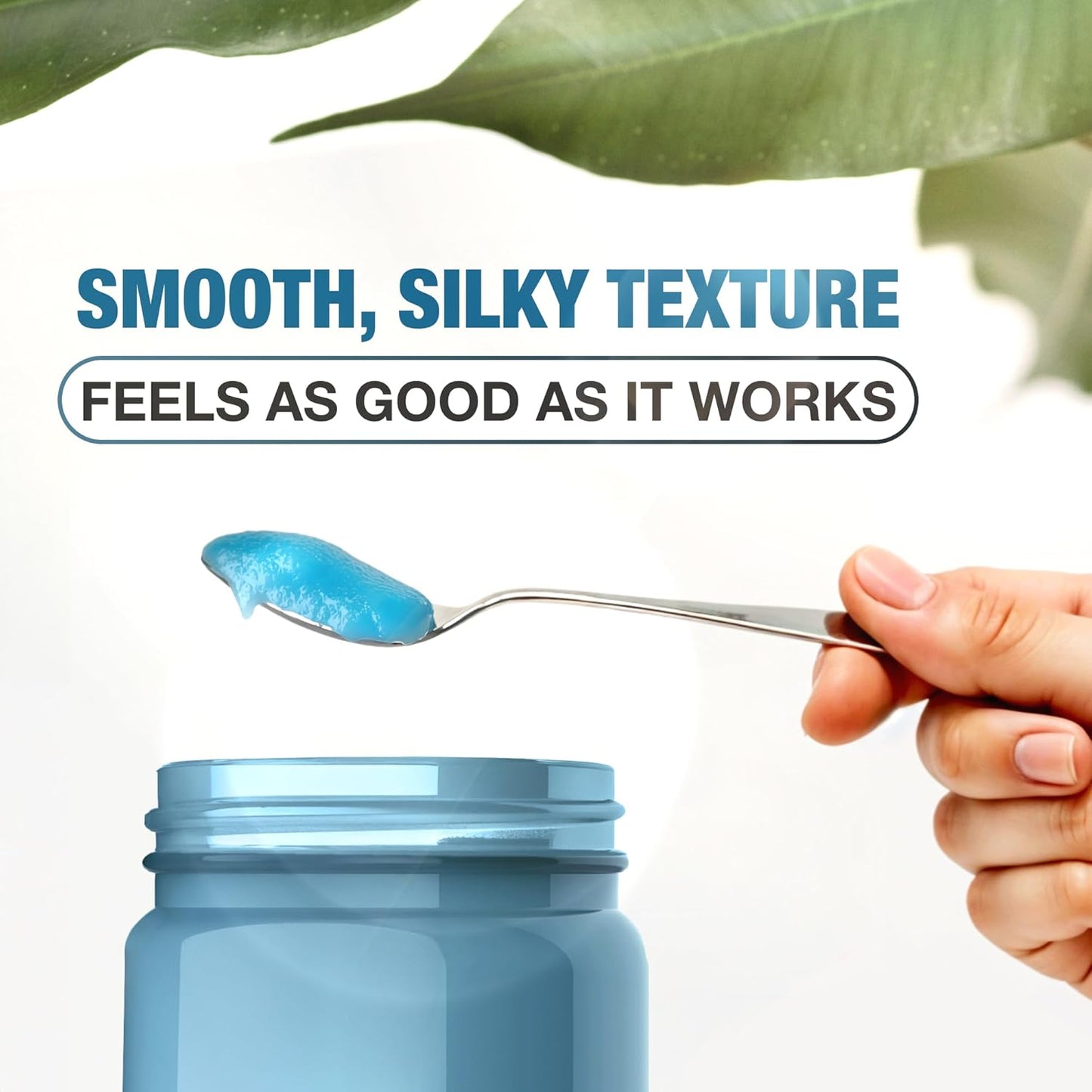 Spoon with blue spirulina sea moss gel showing smooth silky texture above an open jar.