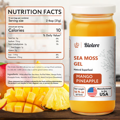 Biolore mango pineapple sea moss gel jar with nutrition facts label and fresh mango and pineapple.