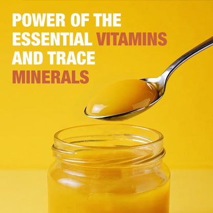Close-up of mango pineapple sea moss gel on a spoon highlighting vitamins and trace minerals.