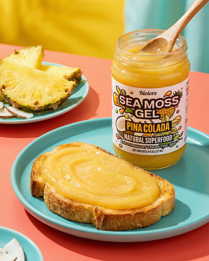 Jar of Sea Moss Gel Pina Colada flavor on a plate with toast and pineapple