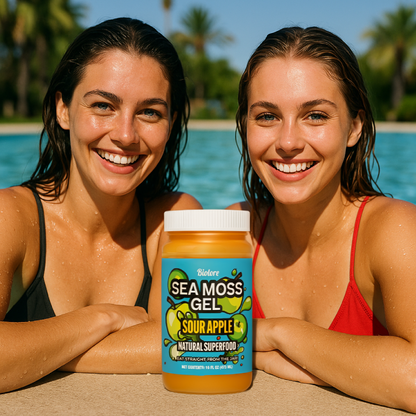 Two women smiling by a pool with Biolore sour apple sea moss gel jar natural superfood.