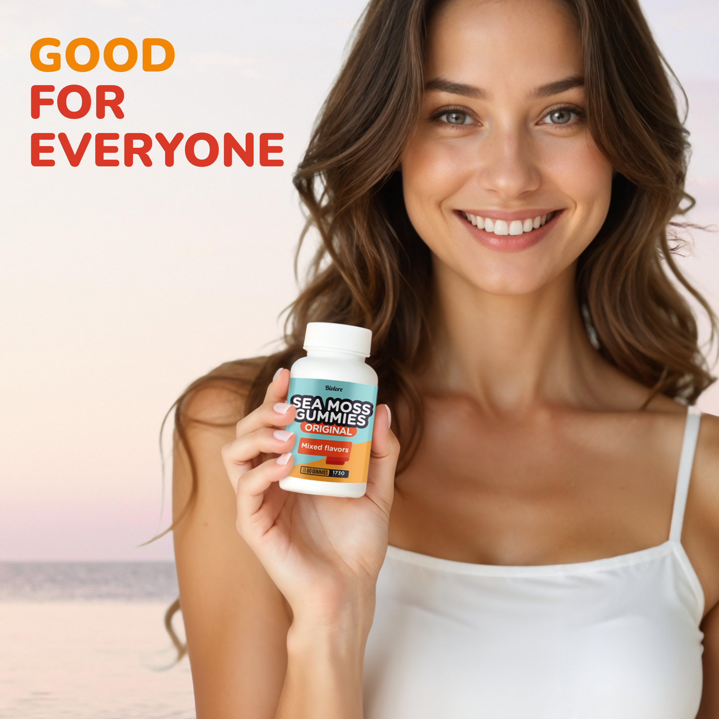 Smiling woman holding a bottle of sea moss gummies, highlighting easy daily wellness support suitable for a wide range of lifestyles.